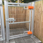 Mk8 left side anti lift fitted to a metal pedestrian gate showing top and bottom adjustable bands protected from access with cover plates gate in closed position