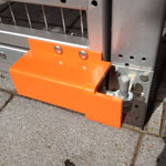 Top view of extended field gate hook on plate being covered by a Mk7 left side anti lift on a metal gate