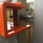 Mk8 left side anti lift on metal gate showing the anti lift plates 15mm gap underneath the hook on the post 